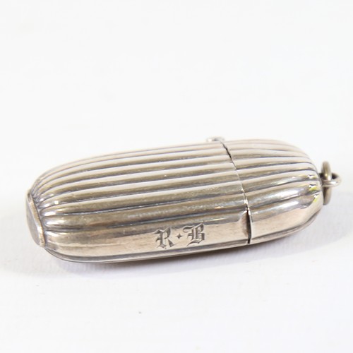 120 - A Victorian fluted silver vesta case, oval form with fluted decoration, by Joseph Fray, hallmarks Ch... 