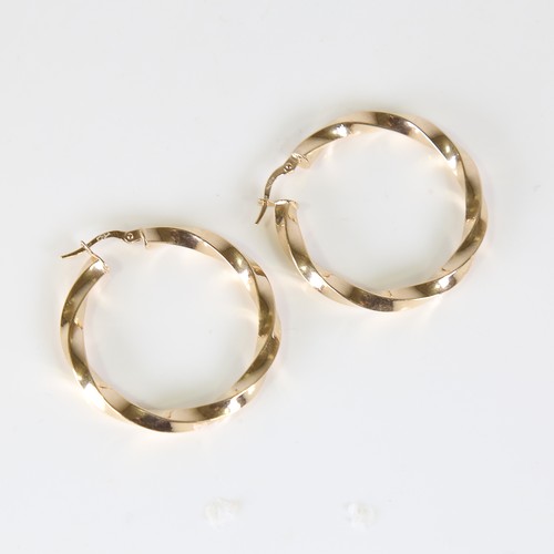 121 - A large modern pair of 9ct gold twisted hoop earrings, earring height 38.4mm, 3g