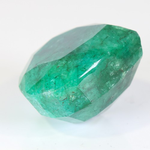 124 - 641ct unmounted pear cut emerald, dimensions: 59.00 x 53.00 x 34.00mm, 128.42g, with GLI Gemstone Re... 