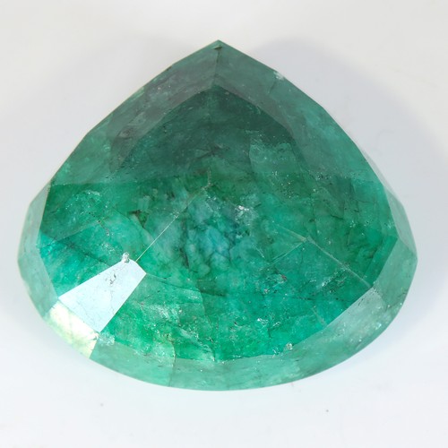 124 - 641ct unmounted pear cut emerald, dimensions: 59.00 x 53.00 x 34.00mm, 128.42g, with GLI Gemstone Re... 