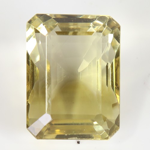 126 - 95.72ct unmounted rectangular step cut yellow quartz, dimensions: 28.66 x 21.66 x 18.59mm, 19.17g, w... 