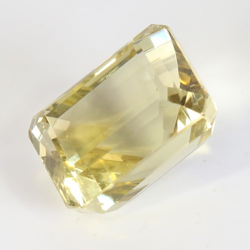 126 - 95.72ct unmounted rectangular step cut yellow quartz, dimensions: 28.66 x 21.66 x 18.59mm, 19.17g, w... 