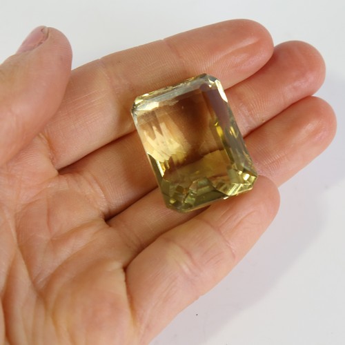 126 - 95.72ct unmounted rectangular step cut yellow quartz, dimensions: 28.66 x 21.66 x 18.59mm, 19.17g, w... 