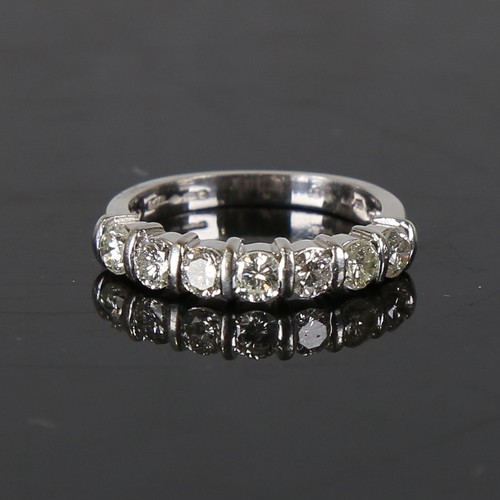 127 - An modern platinum 7-stone diamond ring, set with round brilliant cut diamonds, total diamond conten... 