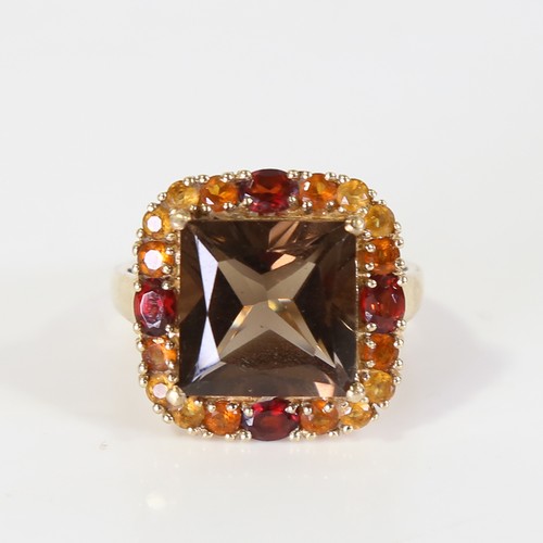 128 - A late 20th century 9ct gold gem-set ring, set with smoky quartz, garnet and citrine, setting height... 