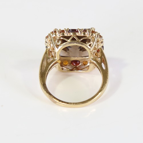 128 - A late 20th century 9ct gold gem-set ring, set with smoky quartz, garnet and citrine, setting height... 