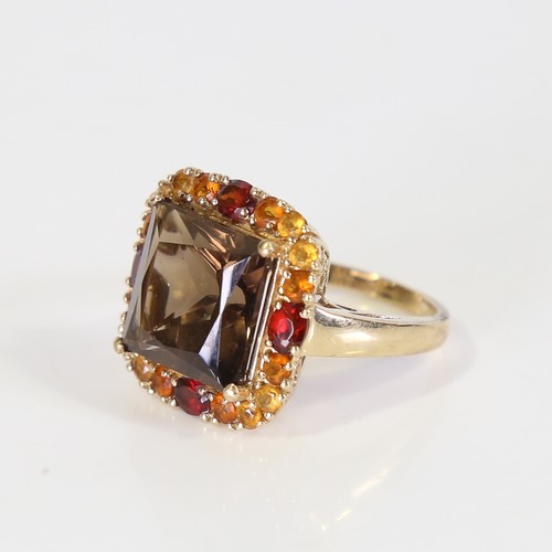 128 - A late 20th century 9ct gold gem-set ring, set with smoky quartz, garnet and citrine, setting height... 