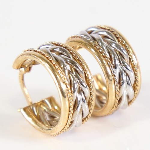 82 - A pair of modern 9ct white and yellow gold hoop earrings, ropetwist design with French lock fittings... 