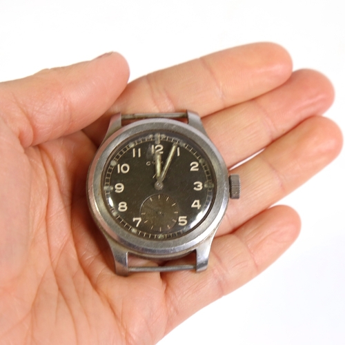 1 - CYMA - a Second World War Period Military Issue 'Dirty Dozen' mechanical wristwatch head, black dial... 
