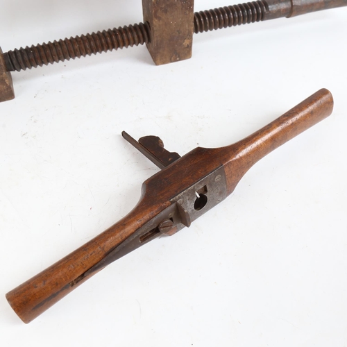 107 - A large early wooden adjustable cramp and an Antique granny's tooth woodworking tool (2)