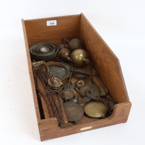 110 - Various clock parts, including pendulums, graduated bells, longcase chain and pulley etc (boxful)