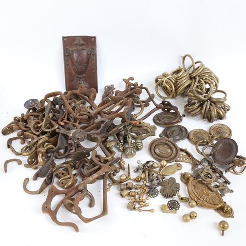 111 - Various door furniture and mounts, including cabinet handles, curtain rings, hallstand hooks etc (2 ... 