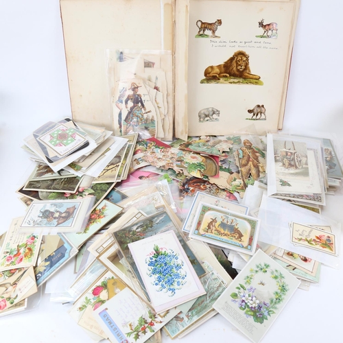 118 - A Victorian scrap album, with various cut-outs, scraps, postcards, Christmas cards etc (2 boxes)