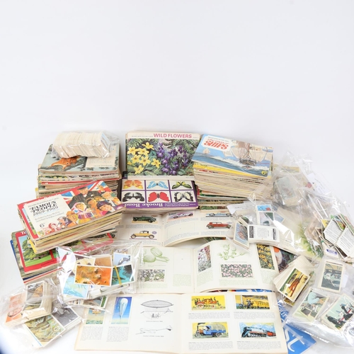 122 - A quantity of various Vintage cigarette cards and picture card albums (2 boxes)