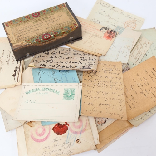 128 - A quantity of 19th and early 20th century signed letters, envelopes, notes and postage stamps (boxfu... 