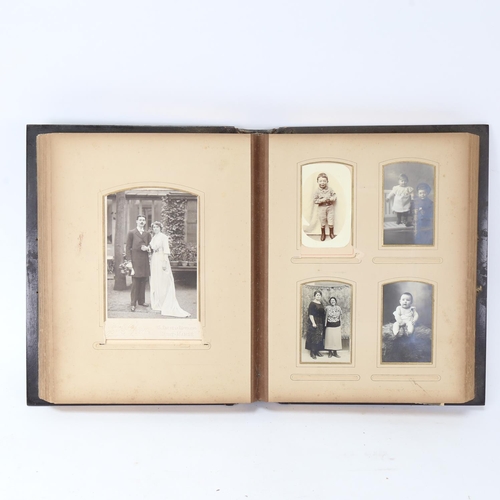 137 - A 19th century French relief moulded cherub family photograph album, majority filled with period pho... 