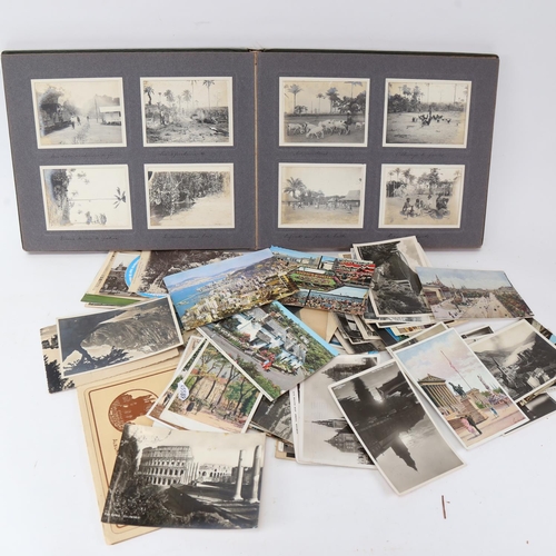 141 - An early/mid 20th century album of African black and white photographs, all with handwritten annotat... 