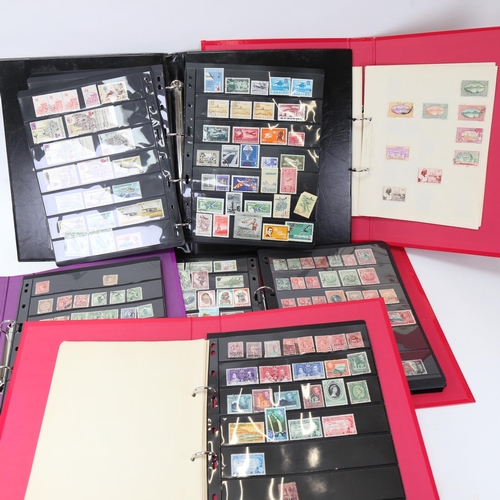 144 - 5 folders of mostly mid-20th century world postage stamps