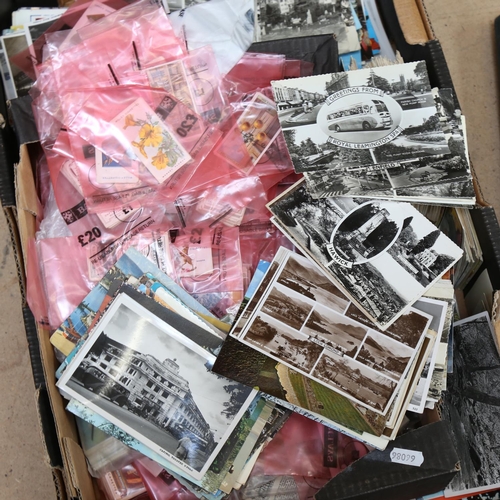 149 - A large quantity of Vintage loose postcards and cigarette cards, including some saucy (2 boxes)