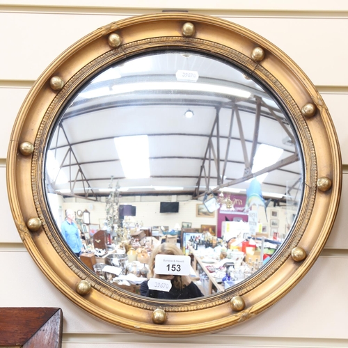 153 - A Vintage circular gilt-framed convex wall mirror, overall diameter 37cm