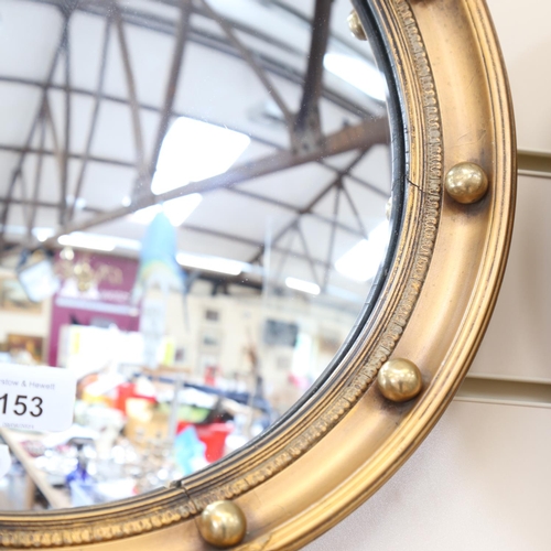 153 - A Vintage circular gilt-framed convex wall mirror, overall diameter 37cm