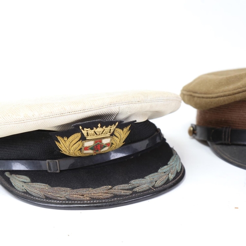 154 - 2 military caps, including 1990/91 Gulf War Kuwait Officer's cap, and Merchant Navy Captain's cap (2... 