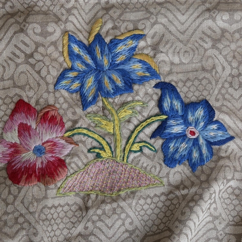 159 - A crewelwork embroidered fabric panel on patterned damask, approx 225cm x 160cm