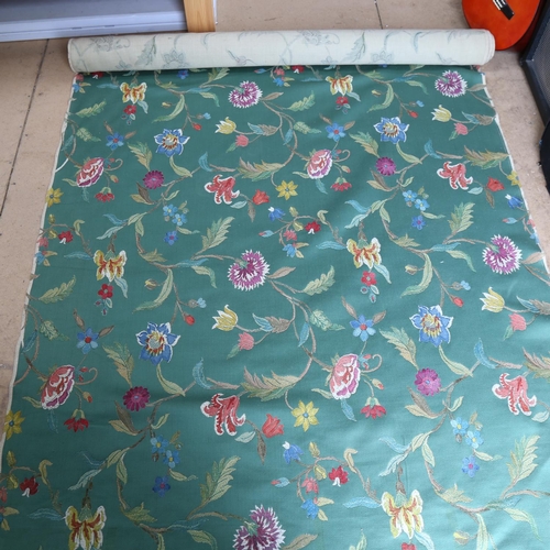 160 - A roll of green woven fabric with floral crewelwork embroidery, approx 700cm x 140cm