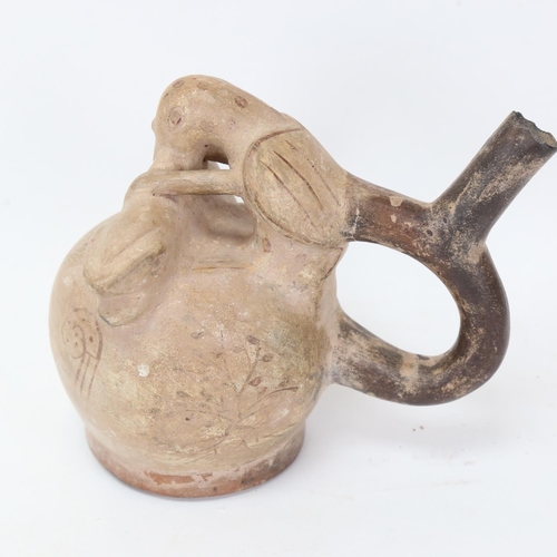 162 - An Ancient Peru (pre-Columbian) Moche stirrup pottery vessel, circa 100 - 700 AD, intended for use i... 