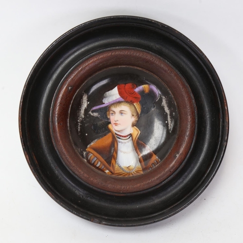 166 - A miniature hand painted porcelain panel, depicting head and shoulders portrait of a lady, framed, o... 