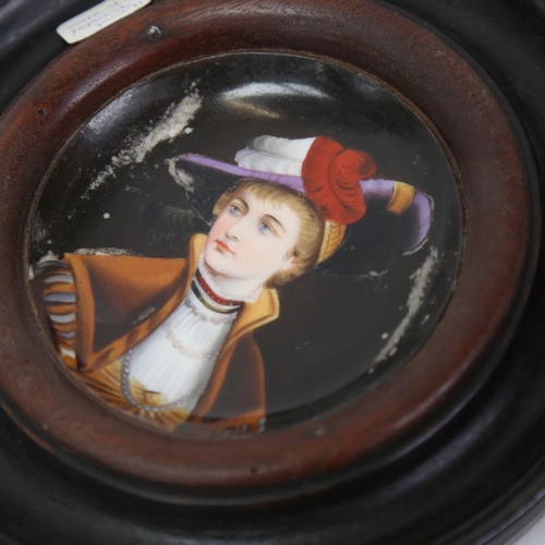 166 - A miniature hand painted porcelain panel, depicting head and shoulders portrait of a lady, framed, o... 