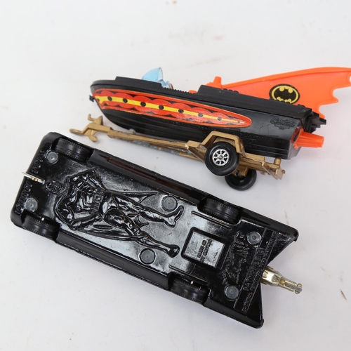 167 - A Corgi 107 Bat Boat and trailer, with diecast Batmobile, and Batman and Robin figures