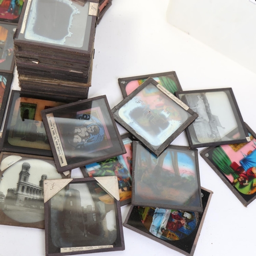 73 - A large quantity of various magic lantern slides, including moving kaleidoscope and many coloured ca... 