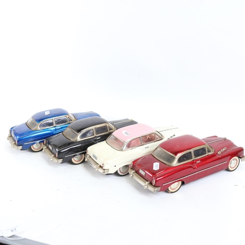 87 - 4 Vintage tinplate friction drive saloon cars, length 30cm (4)