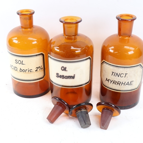 622 - A Vintage set of 3 brown glass apothecary bottles and stoppers, height 23cm (3)