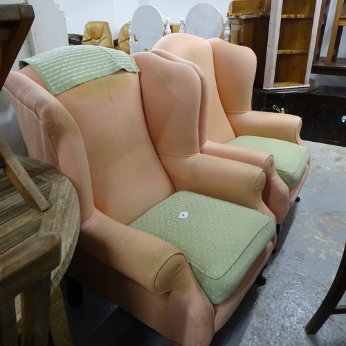 1981 - A pair of upholstered wing armchairs (for re-upholstery)