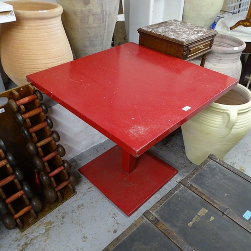 1990 - A red painted metal square-top garden table, W80cm, H75cm