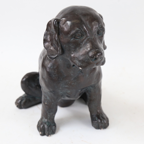 584 - A painted pottery puppy sculpture, 24cm