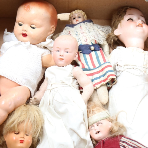 438 - A group of porcelain and composition dolls