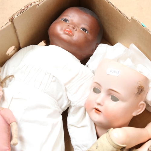 439 - A group of porcelain and composition dolls