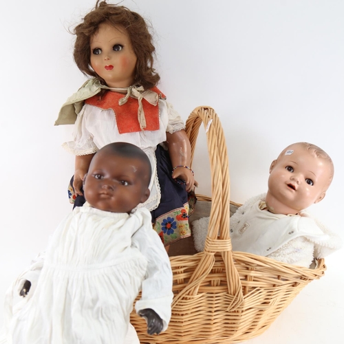 446 - A group of porcelain and composition dolls