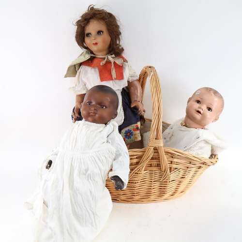 446 - A group of porcelain and composition dolls