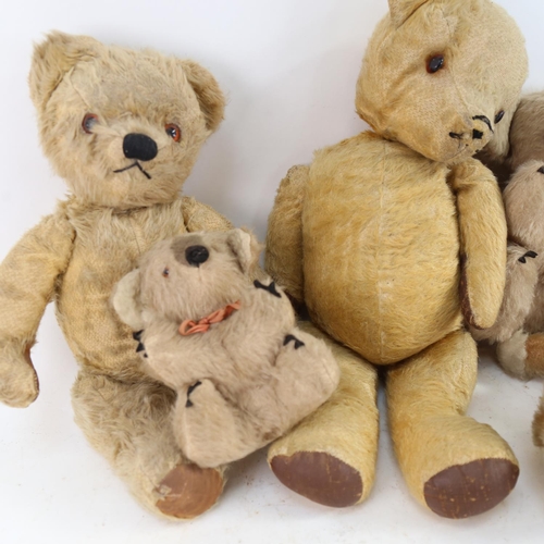 447 - A group of teddy bears, a musical soft toy cat with spinning tail etc (5)