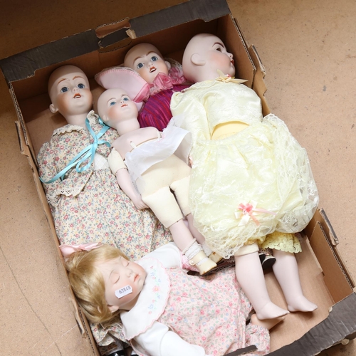 454 - A group of porcelain and composition dolls