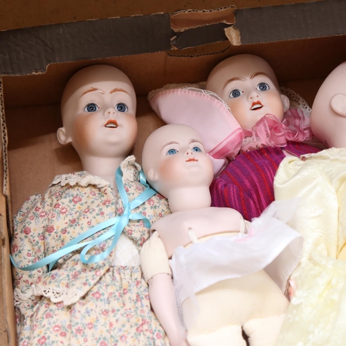 454 - A group of porcelain and composition dolls