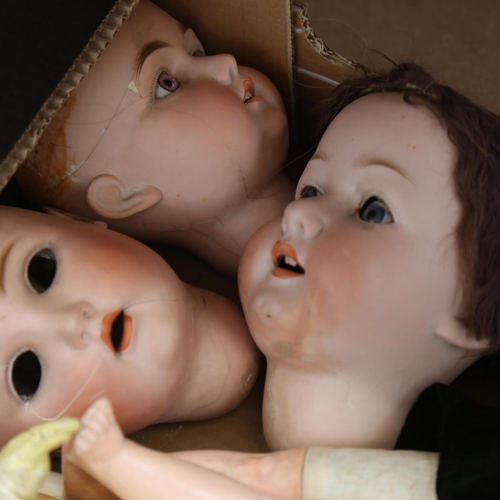 455 - A group of porcelain and composition dolls