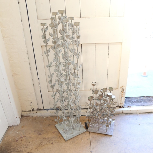 494 - 2 Oka  wrought-metal candle stands, tallest 108cm