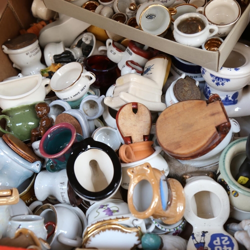 495 - A large collection of ornamental souvenir porcelain lavatories and chamber pots (boxful)