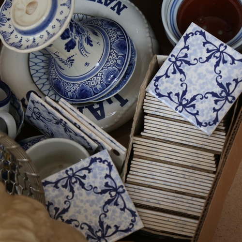 498 - A plaster head, blue and white china, mid century tiles, and a box of beer mats