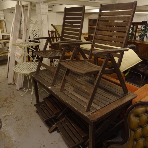 1978 - A rectangular hardwood extending garden table, together with a set of 6 matching folding chairs